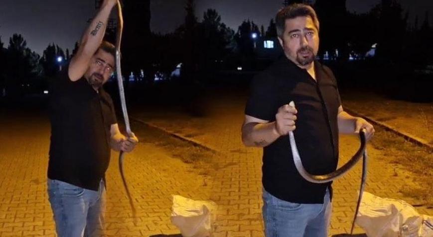 Çamaşır makinesinde yılan avı! Metrelerce uzunlukta, elleriyle çıkardı