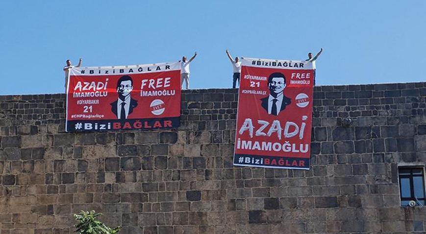 Diyarbakır’da surlara asılan ‘İmamoğlu’ pankartlarına polis müdahalesi