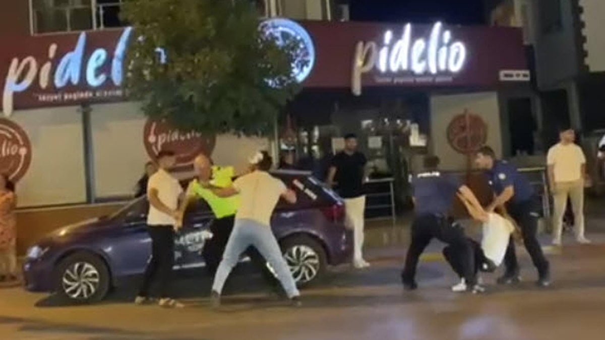 İzmir’de polise saldırı kamerada: 2 tutuklama